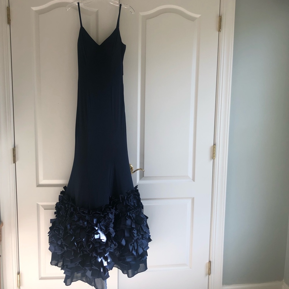 Navy blue sleek gown with satin bow detail